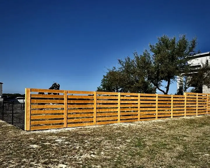 Horizontal cedar privacy fence, finished run