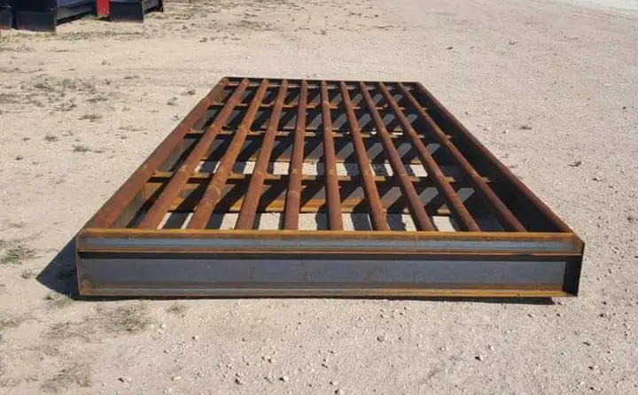 End view, pipe rails welded on a channel frame