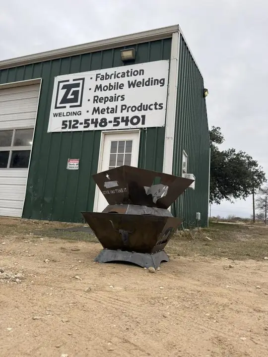 Two-tier Texas fire pit outside the shop