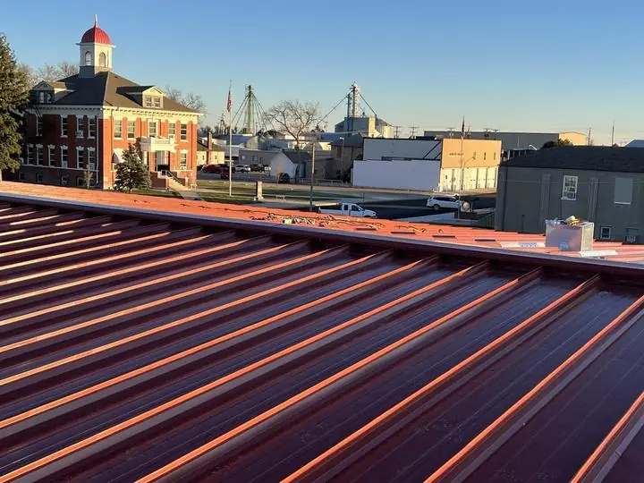 New standing seam roof panels at sunset